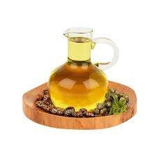 Bottle of Sesame Oil with benefits for cooking, skincare, and hair care displayed.