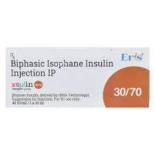 A 10ml vial of Xsulin 30/70 Insulin Injection with clear labeling and dosage instructions.