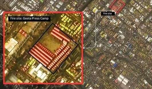 Aerial view of Maha Kumbh Mela 2025 showing densely packed tents and crowds at the riverbanks in Prayagraj.