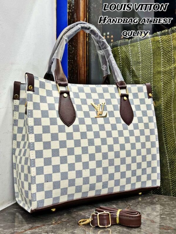 Elegant white Louis Vuitton tote bag made with premium materials, featuring a clean and timeless design, spacious interior, and stylish hand block prints