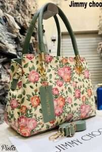 Charming cream handbag embellished with intricate floral designs, blending elegance and functionality for everyday use.