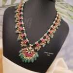 Festive outfit accessorized with a traditional gold necklace