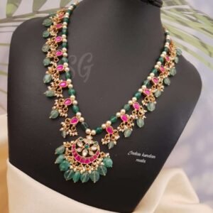 Festive outfit accessorized with a traditional gold necklace