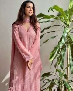 Chikankari embroidery 3-piece suit with georgette dupatta and lace detailing.