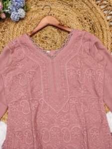 Chikankari embroidery 3-piece suit with georgette dupatta and lace detailing.