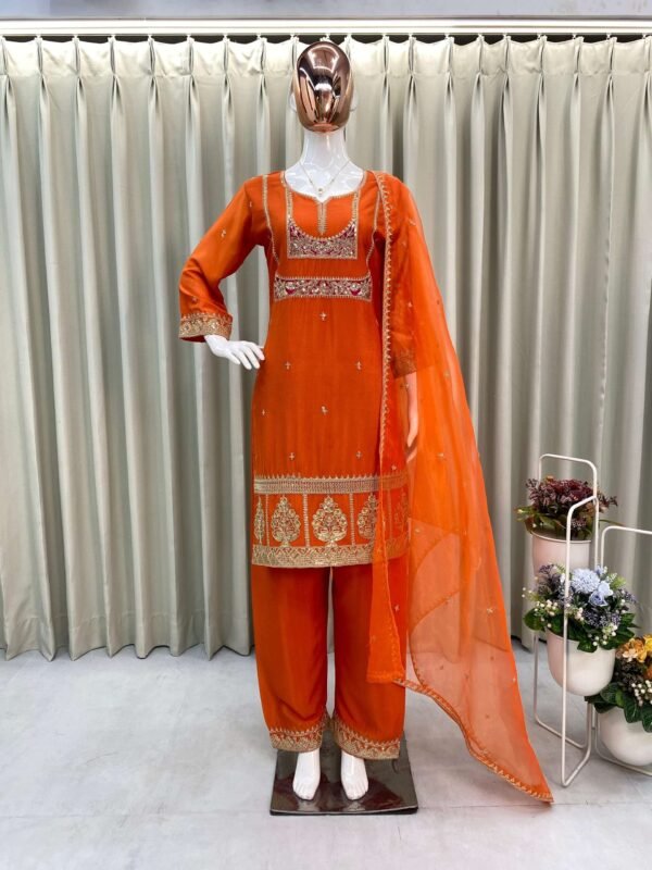 Designer sequin-embroidered top, pant, and organza dupatta set in Air Tex Chinon fabric.