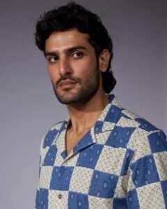 "Close-up view of premium cotton fabric showcasing the vibrant print and soft texture for men’s half-sleeve shirts.