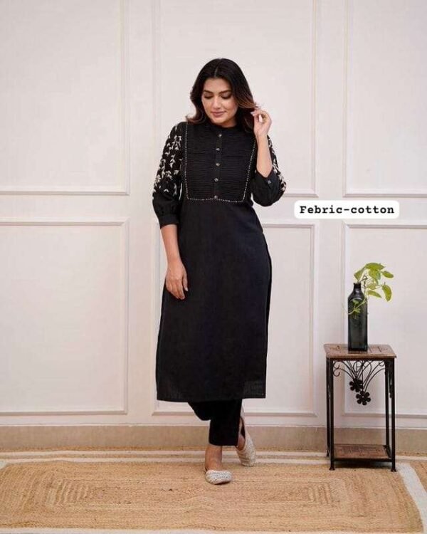Model wearing a trendy office wear kurti pant set with intricate detailing