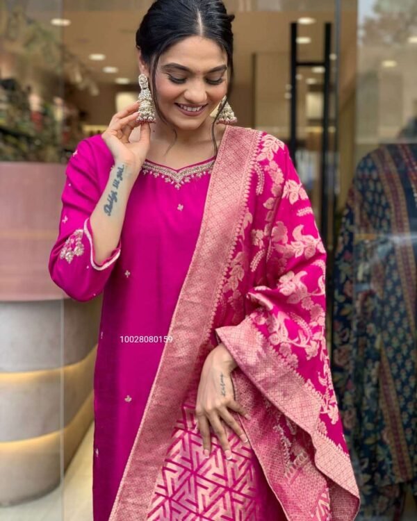 Gorgeous silk top-bottom set with intricate embroidery and jacquard dupatta, ideal for weddings and festive occasions.