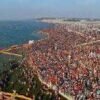 Vibrant clusters of red, white, and yellow tents captured from space during the grand Maha Kumbh Mela 2025