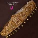 Elegant gold replica hip belt with bow design for women