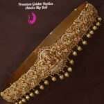 Elevate your style with this Premium Elegant Gold Replica Adult Hip Belt with Bow Detailing. Perfect for sarees, lehengas, and ethnic outfits. Shop now!