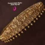 Elevate your style with this Premium Elegant Gold Replica Adult Hip Belt with Bow Detailing. Perfect for sarees, lehengas, and ethnic outfits. Shop now!
