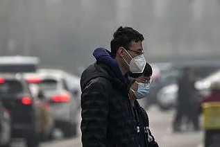Office and healthcare workers wearing protective face masks while performing their jobs during the NB.1.8.1 COVID variant outbreak in 2025